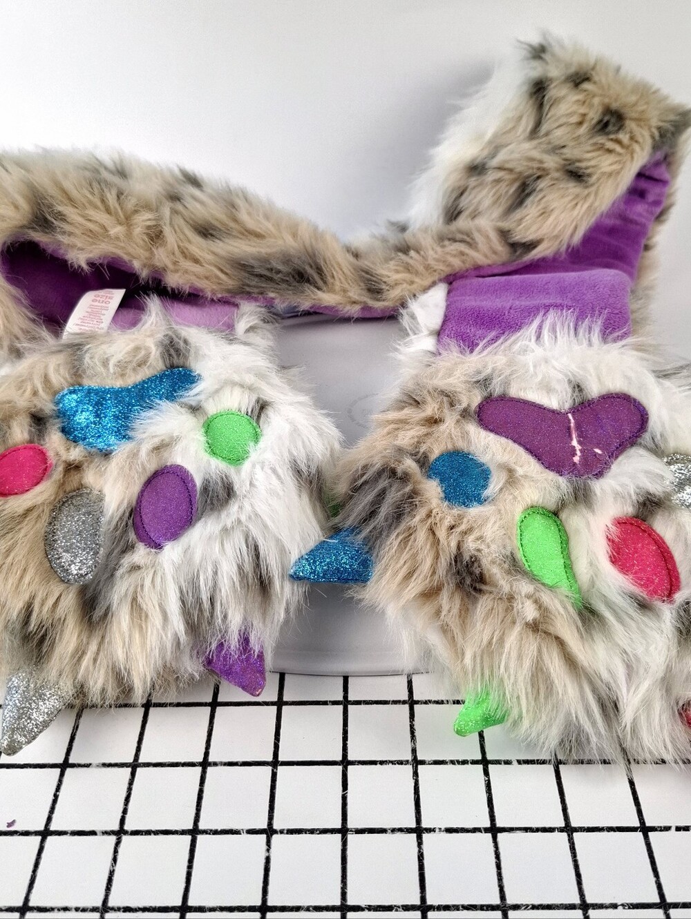 Plush Faux Fur Monster Sole/ Muff One Size Fits Most with Colorful Pocket Claws.